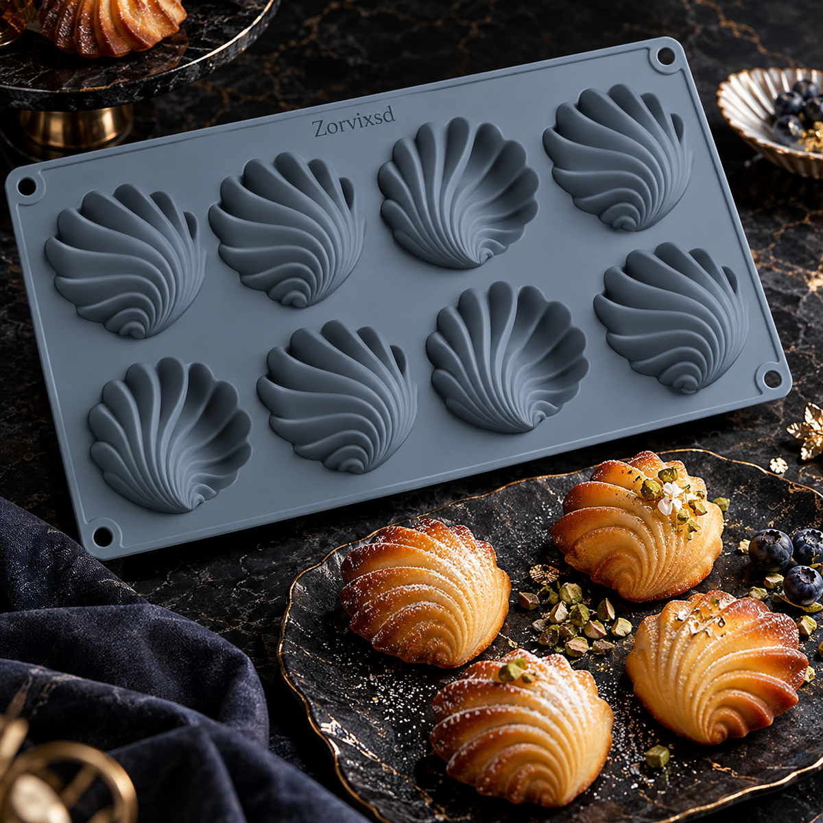 Slate blue mold with repeated shell-shaped relief cavities
